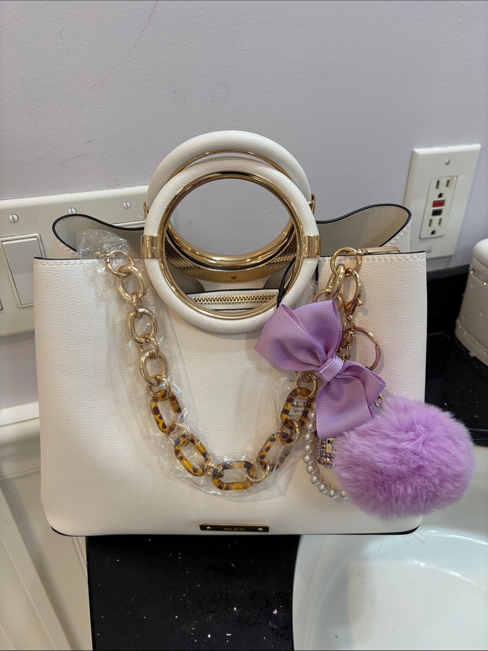 NWT Aldo White Tote with Gold Rings and Lilac Pom Charm